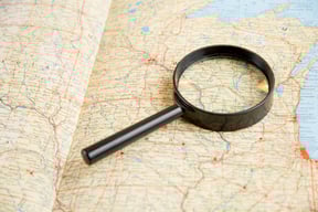 Magnifying glass and map